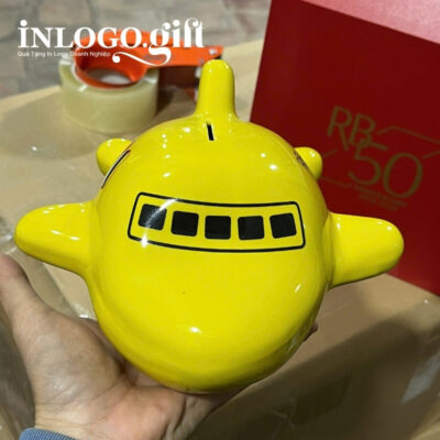 Ống tiết kiệm in logo màu vàng dáng máy bay