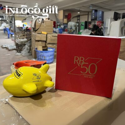 Ống tiết kiệm in logo màu vàng dáng máy bay