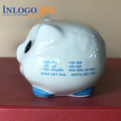 Heo đất in logo màu trắng tai xanh dương kích thước 13x14x14cm HĐ-08