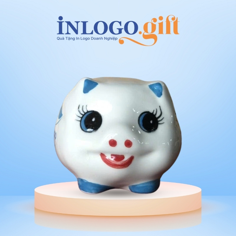 Heo đất in logo màu trắng tai xanh dương kích thước 13x14x14cm HĐ-08