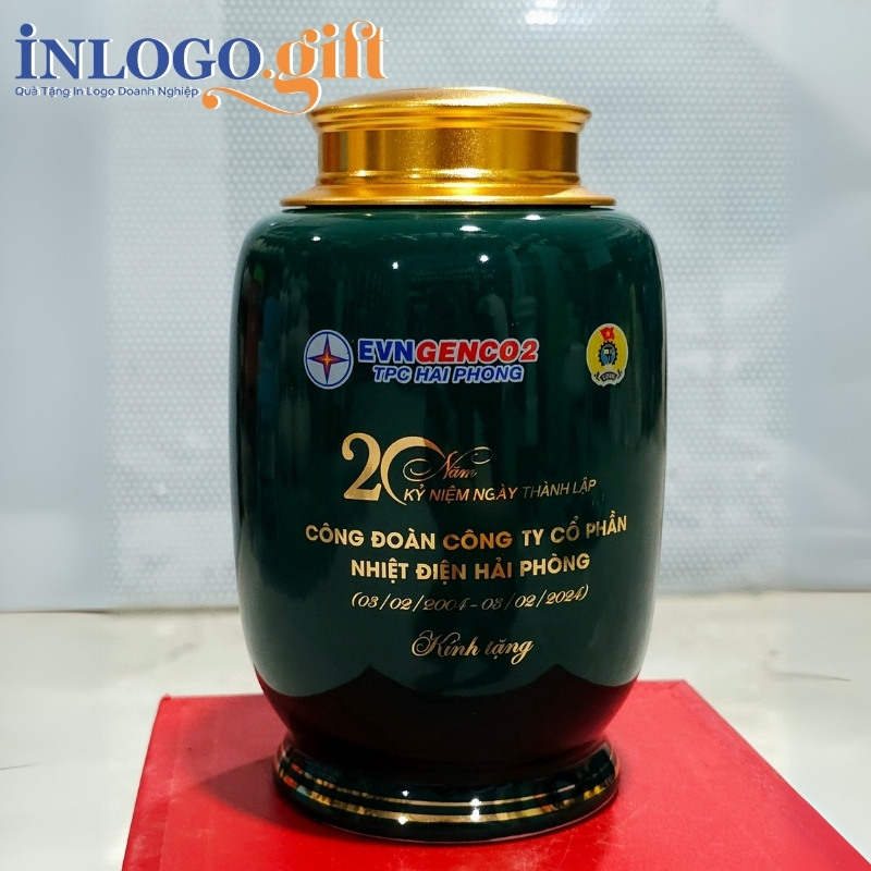 Hũ đựng trà in logo dáng bí kẻ chỉ chân men xanh họa tiết toàn nhà EVN kẻ vàng 200g HĐT-02