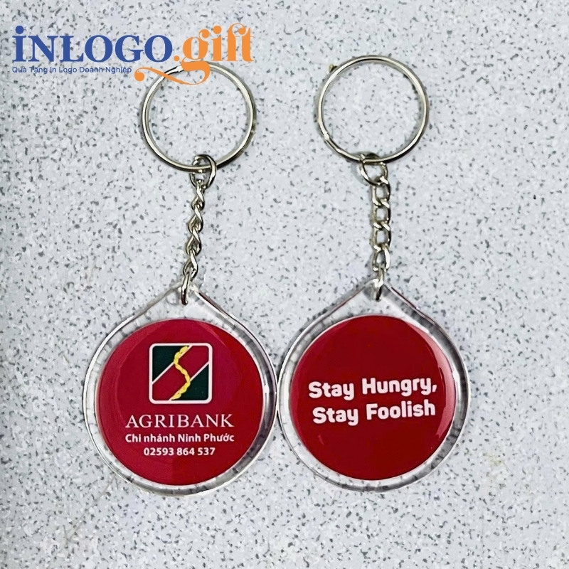 Móc khóa in logo đổ keo có viền hình tròn màu đỏ 4cmx4cm MK-03