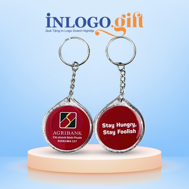Móc khóa in logo đổ keo có viền hình tròn màu đỏ 4cmx4cm MK-03