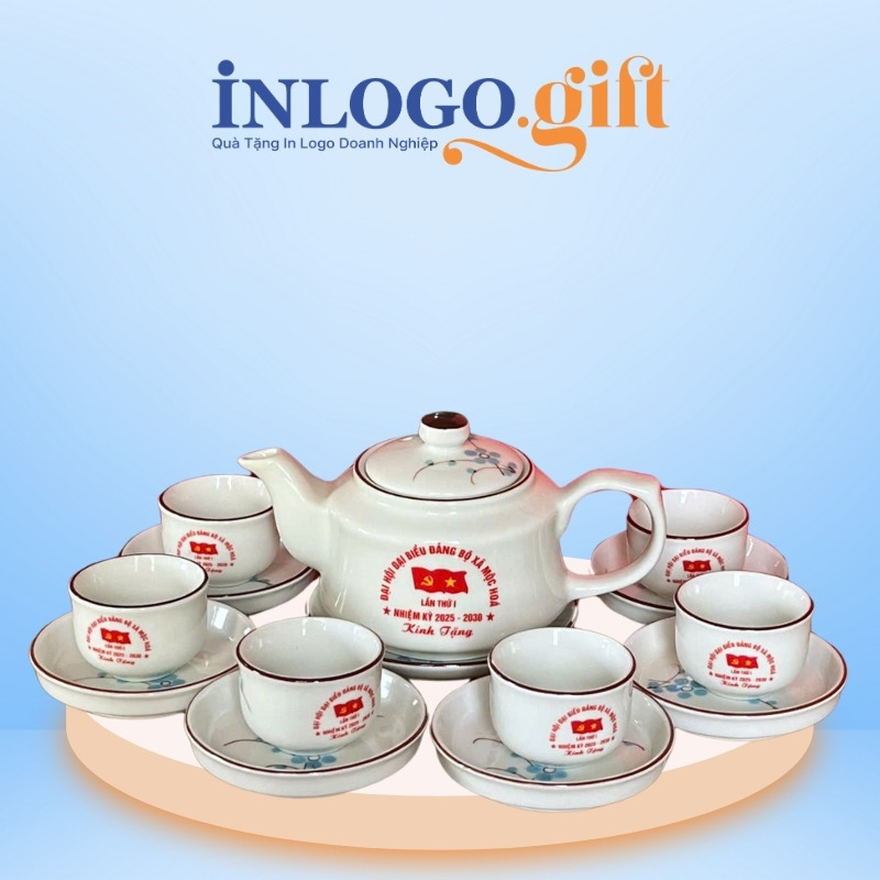 Bộ ấm chén quà tặng Đại hội in logo dáng vai vuông hoa mai xanh 500ml AC-31